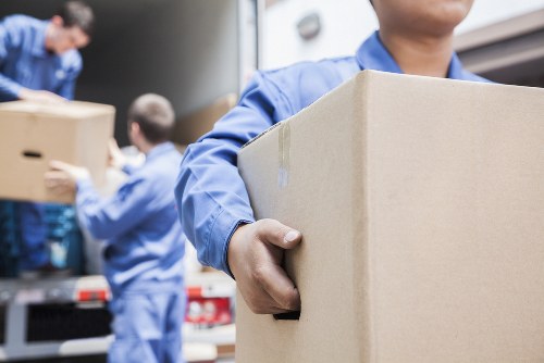 Professional flat removals in Shoreditch with moving boxes and furniture