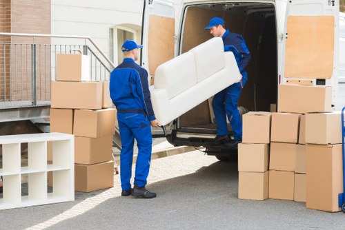 Shoreditch home moving team unloading boxes at a new property