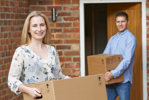 Professional moving support in Shoreditch handling boxes and office items