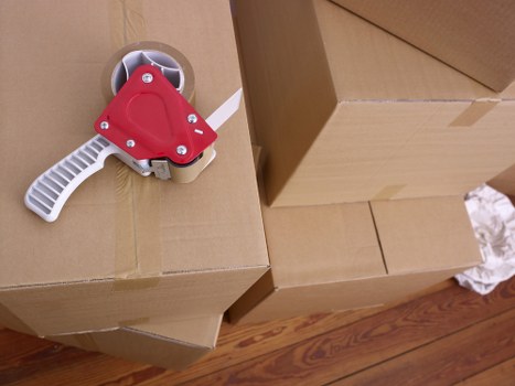 Loading furniture and boxes into a removals van in Shoreditch