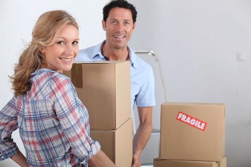 Professional movers loading furniture for a Shoreditch relocation
