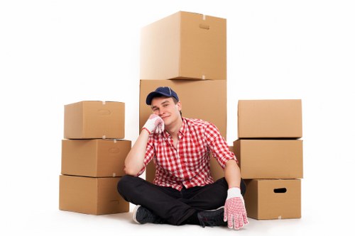 Experienced movers packing household items for a Shoreditch relocation